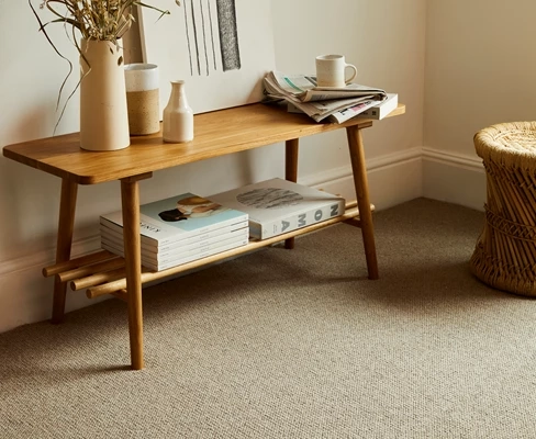 Beige wool carpet in a minimalist living room