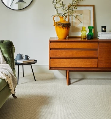 Modern grey wool stair runner with brass carpet rods