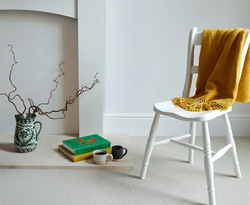 Modern wool stair runner with brass carpet rods