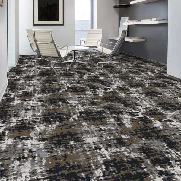 office lounge featuring patterned wool tufted carpet in grey and charcoal.