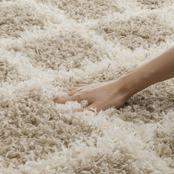 thick, beige and white checkered frieze wool carpet.